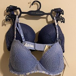 Bra 34B light baby blue floral patterns and navy blue lace. Never been worn.